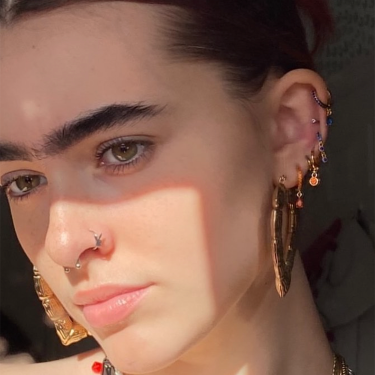 Imogen Blue Huggie Hoops Model