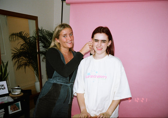 girls are using gold huggie hoop earrings