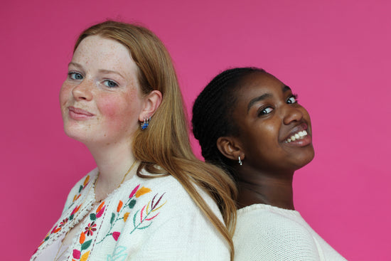 they are wearing gold huggie earring