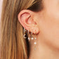 Romilly Crystal Gold Droplet Star Huggie Earrings