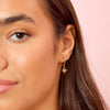 Cosima Gold Rainbow Star Huggie Earrings
