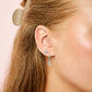 Camilla Turquoise Silver Cross Huggie Earrings
