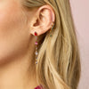 Cosima Gold Rainbow Star Huggie Earrings