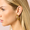 Evie Pink Gold Huggie Earrings