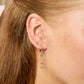 Ellica Pink Gold Droplet Huggie Earrings