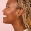 Isabella Gold Rainbow Cross Huggie Earrings