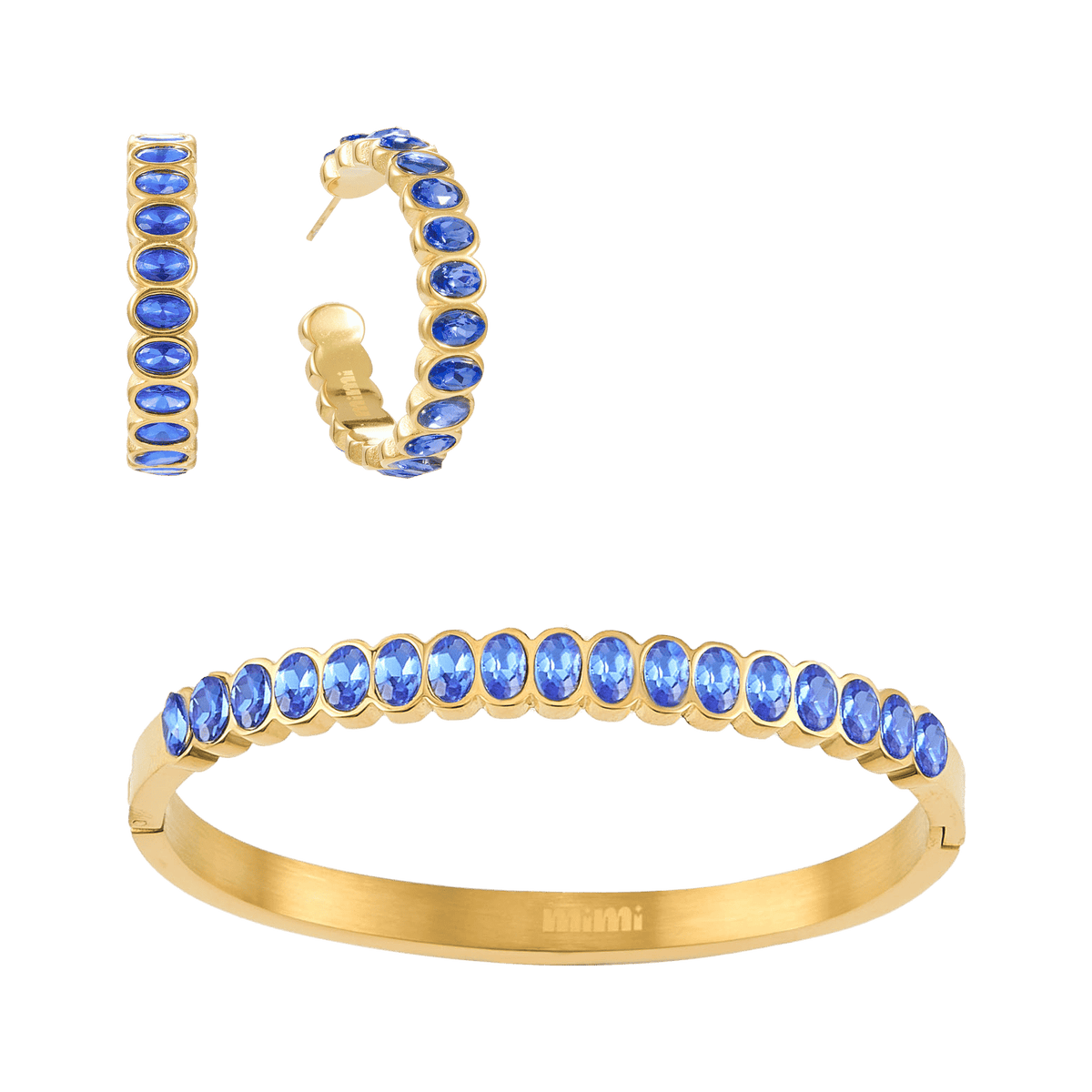 A Bijoux De Mimi gold jewellery set featuring a bangle bracelet, hoop earrings, all adorned with oval-cut blue gemstones.