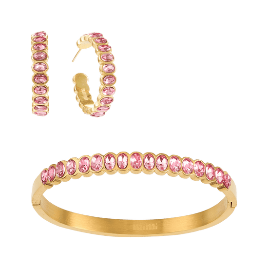 Bijoux De Mimi Gold jewellery set featuring a bangle bracelet and matching hoop earrings, both adorned with oval pink gemstones
