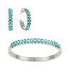 A Bijoux De Mimi silver jewellery set featuring a bangle bracelet and matching hoop earrings, both adorned with oval-cut light turquoise gemstones.