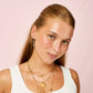 Ellica Turquoise Gold Droplet Huggie Earrings